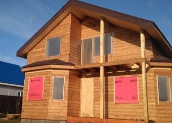 Облицовка стен каркасного дома имитацией бруса